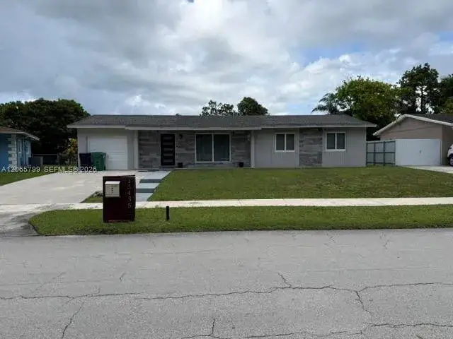 3 bedroom 2 bath Residential for sale at 15435 SW 108th Ct, Miami FL 33157