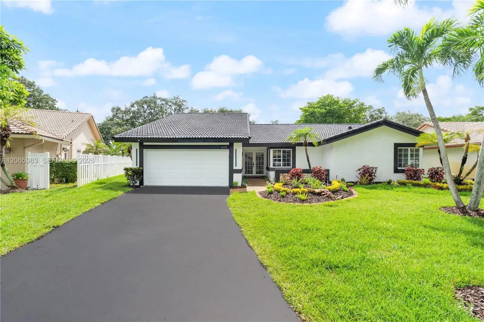 4 bedroom 2 bath Residential for sale at 695 NW 107th Ln, Coral Springs FL 33071