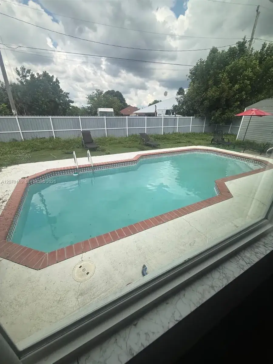 5 bedroom 3 bath Residential for sale at 129 E Lake Dr, Lehigh Acres FL 33936