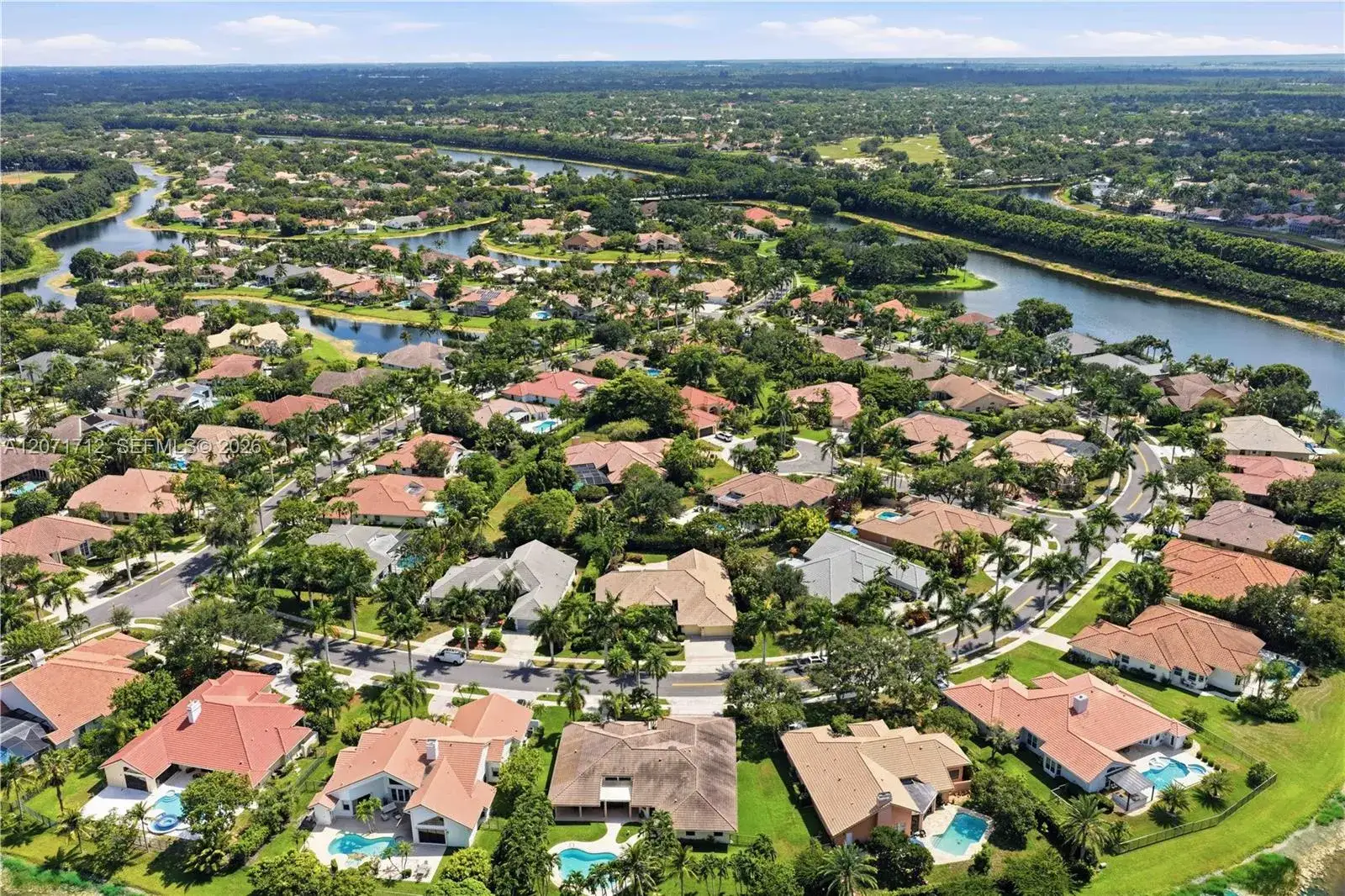5 bedroom 4 bath Residential for sale at 360 NE Coconut Cir, Weston FL 33326