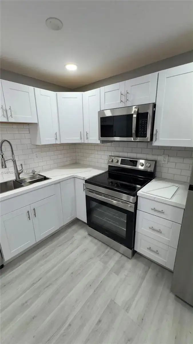 1280 NW 43rd Ave # 303, Lauderhill FL 33313