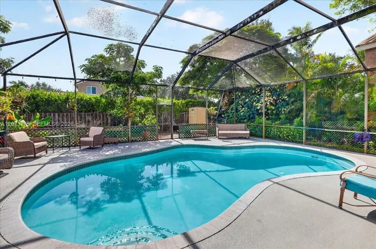 4 bedroom 2 bath Residential for sale at 7320 NW 68th Way, Parkland FL 33067
