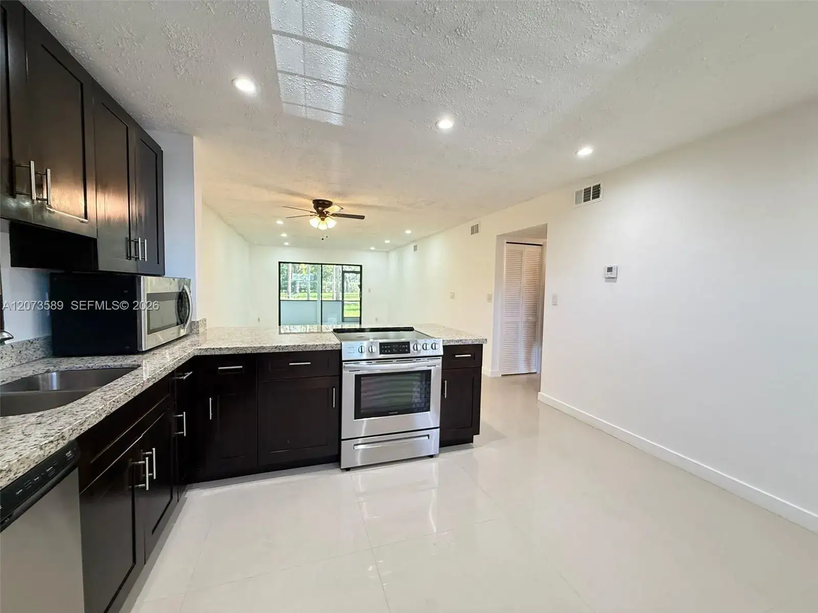 2 bedroom 2 bath Residential for sale at 6095 N Sabal Palm Blvd # 103, Tamarac FL 33319