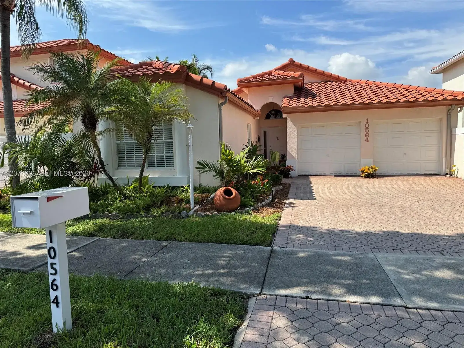 4 bedroom 2 bath Residential for sale at 10564 NW 57th St, Doral FL 33178