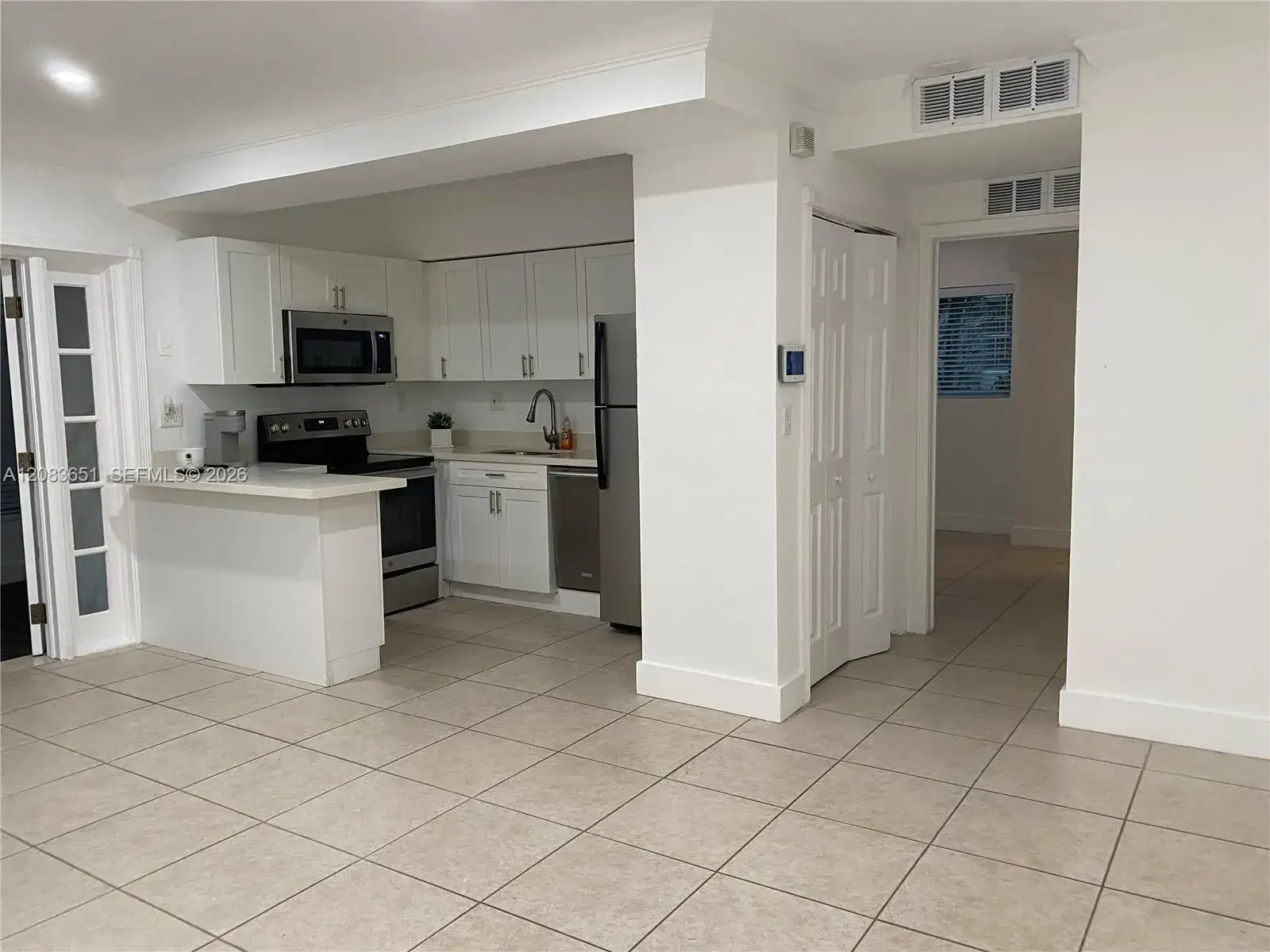 1 Edgewater Dr + DEN # 103, Coral Gables FL 33133