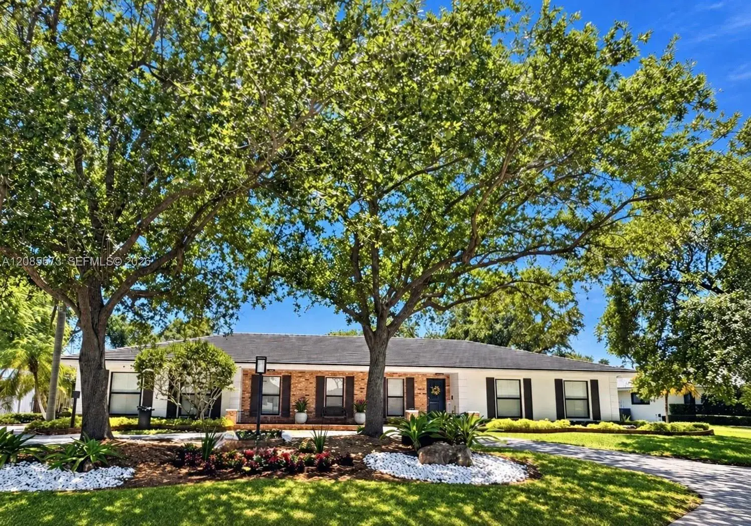 5 bedroom 4 bath Residential for sale at 7440 SW 174th St, Palmetto Bay FL 33157