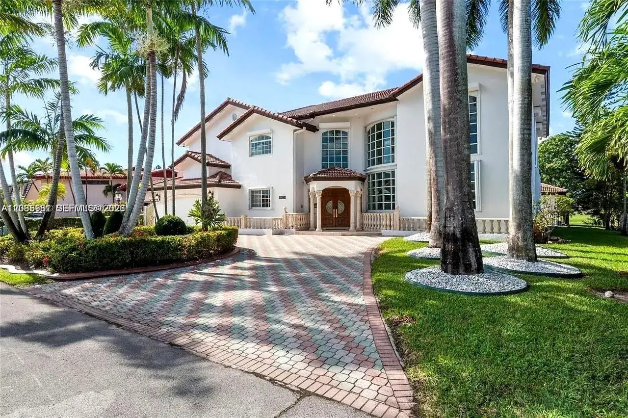 4 bedroom 5 bath Residential for sale at 19420 W Saint Andrews Dr, Hialeah FL 33015