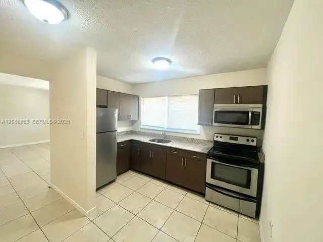 2 bedroom 1 bath Residential Lease for rent at 7626 NE 6th Ct # 5, Miami FL 33138