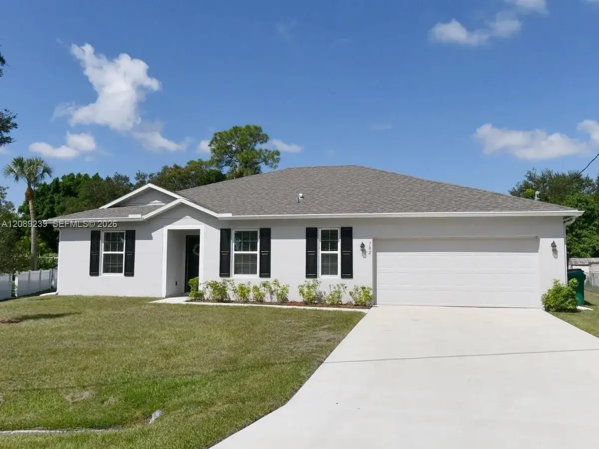 4 bedroom 2 bath Residential for sale at 702 SW Aster Rd, Port St. Lucie FL 34953