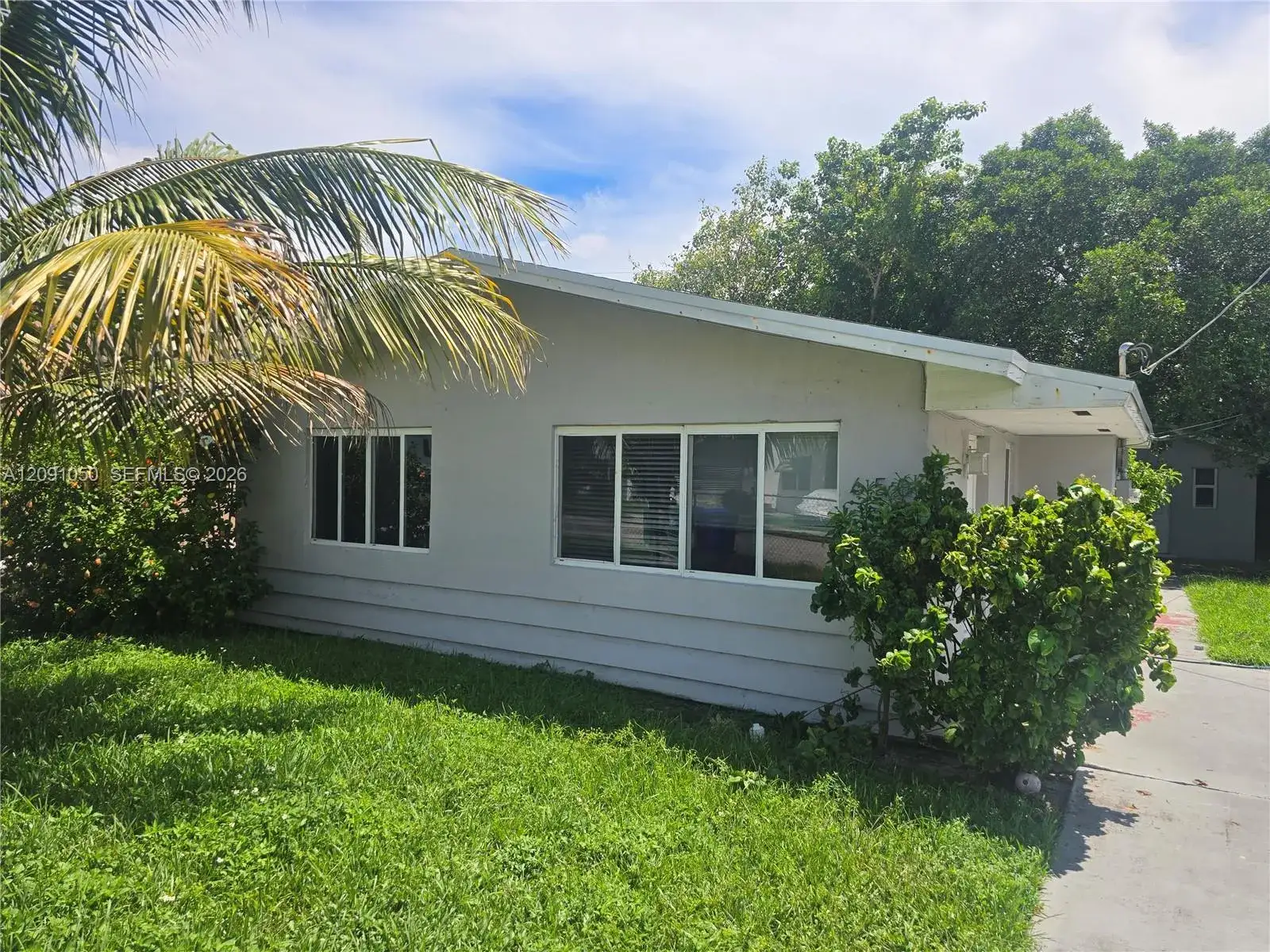 Residential Income for sale at 650 NW 49th St, Miami FL 33127