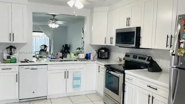 3 bedroom 2 bath Residential Lease for rent at 8818 SW 113th Place Cir E, Miami FL 33176
