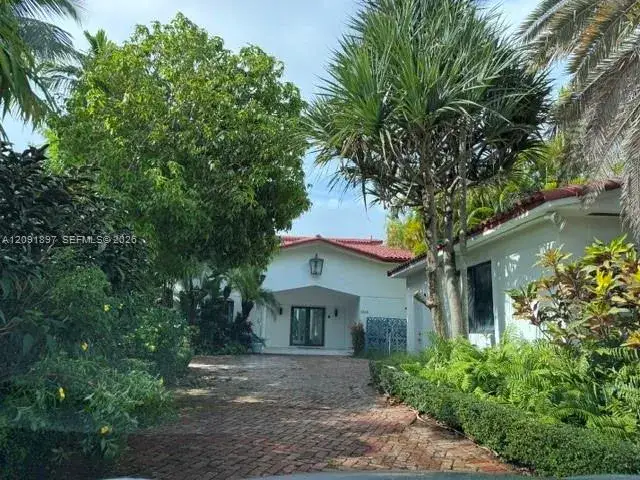 5 bedroom 4 bath Residential for sale at 1028 88th St, Surfside FL 33154