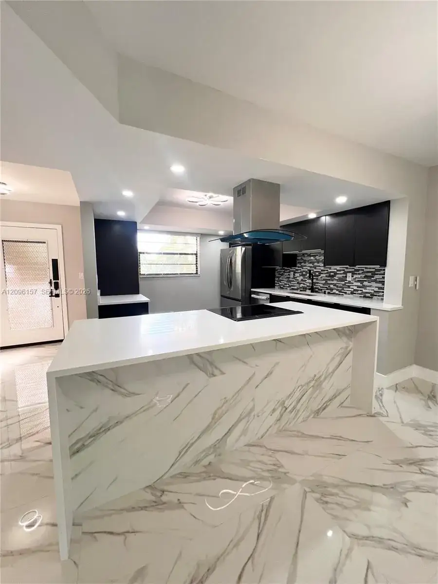 4940 E Sabal Palm Blvd # 312, Tamarac FL 33319