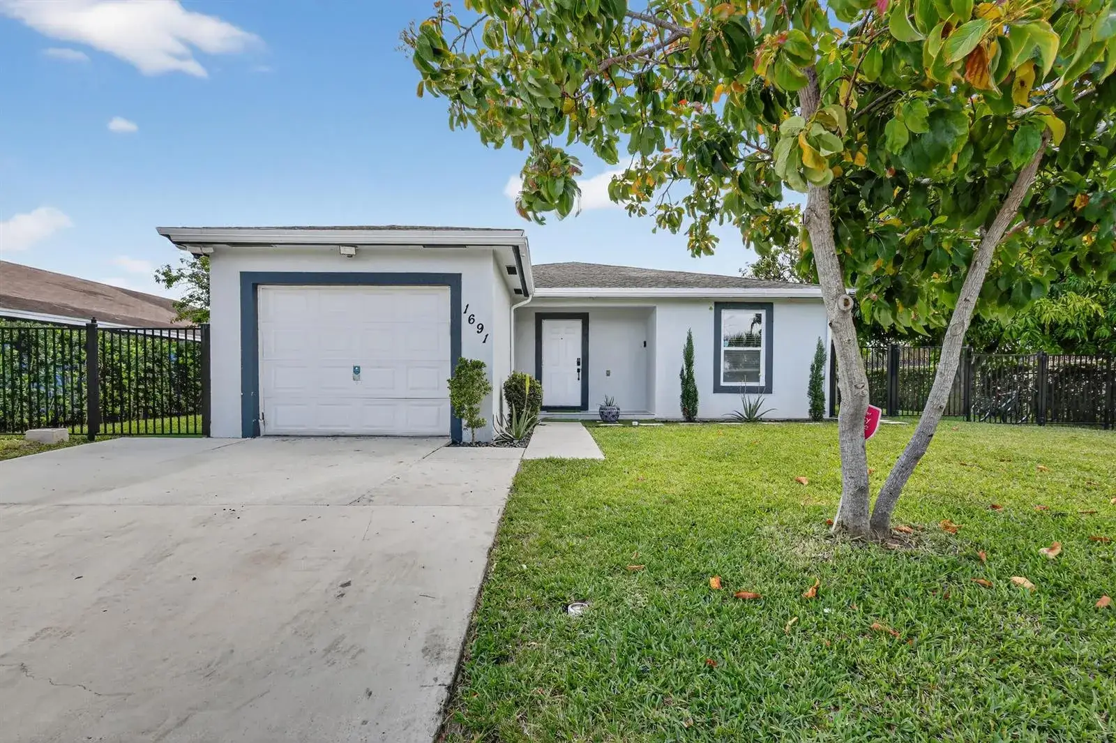4 bedroom 2 bath Residential for sale at 1691 W 26th Court, Riviera Beach FL 33404