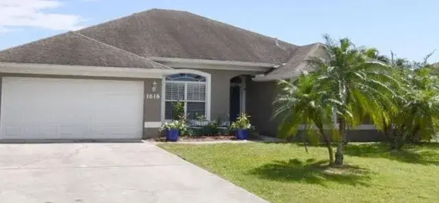4 bedroom 3 bath Residential for sale at 1618 SW Nervia Avenue, Port St. Lucie FL 34953
