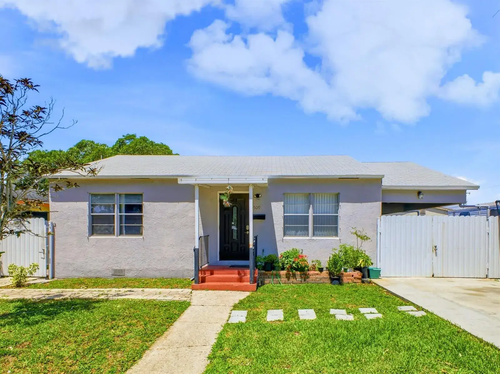 5 bedroom 4 bath Residential for sale at 5509 W Garden Avenue, West Palm Beach FL 33405