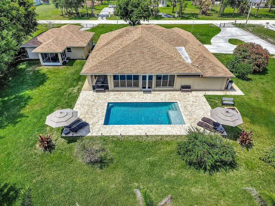 5 bedroom 4 bath Residential for sale at 13166 71st Place N, West Palm Beach FL 33412
