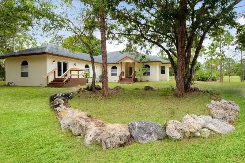 6 bedroom 5 bath Residential for sale at 4935 Lame Panther Lane, Loxahatchee FL 33470