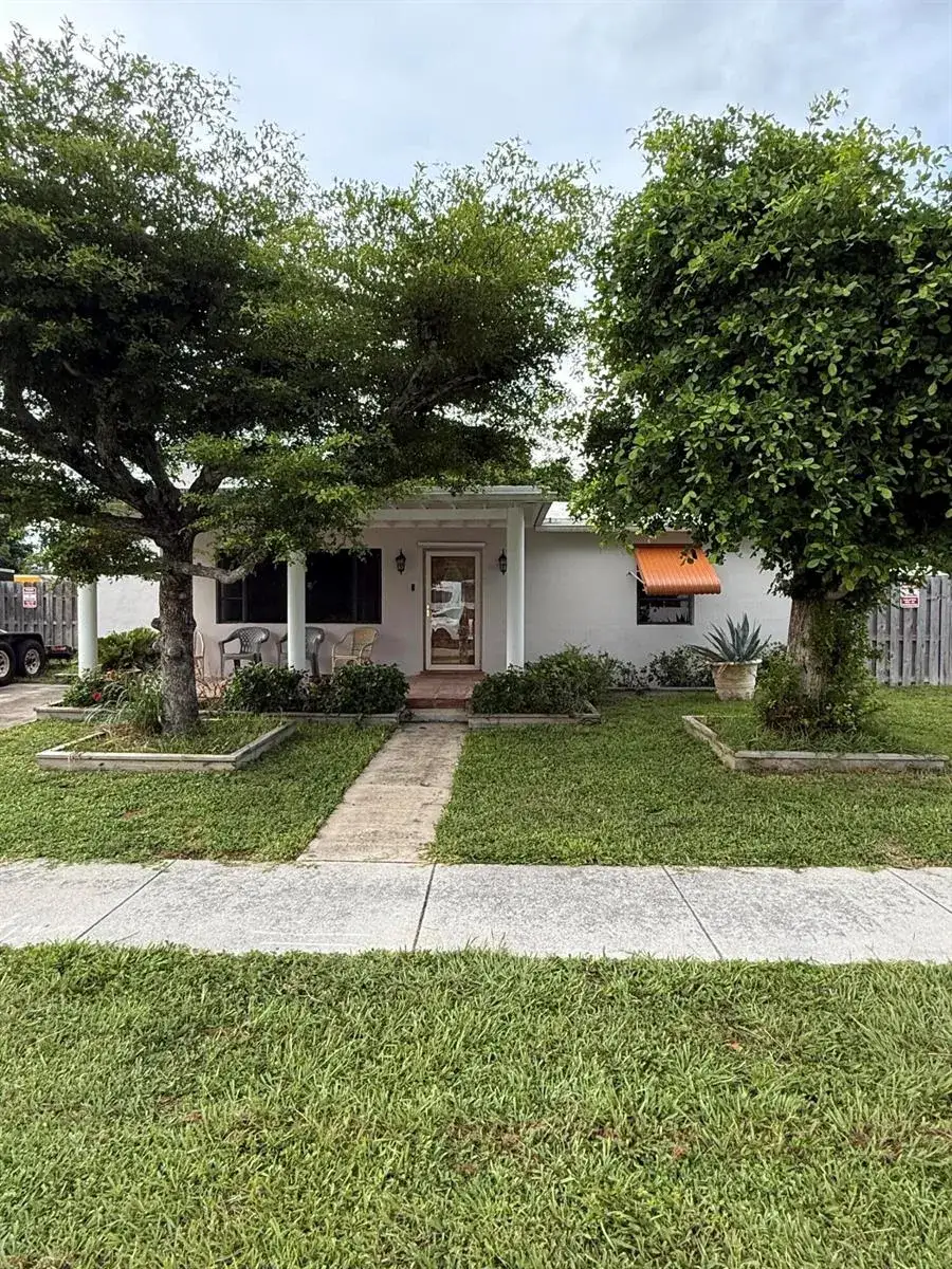 4 bedroom 2 bath Residential Lease for rent at 817 Elm Road, West Palm Beach FL 33409