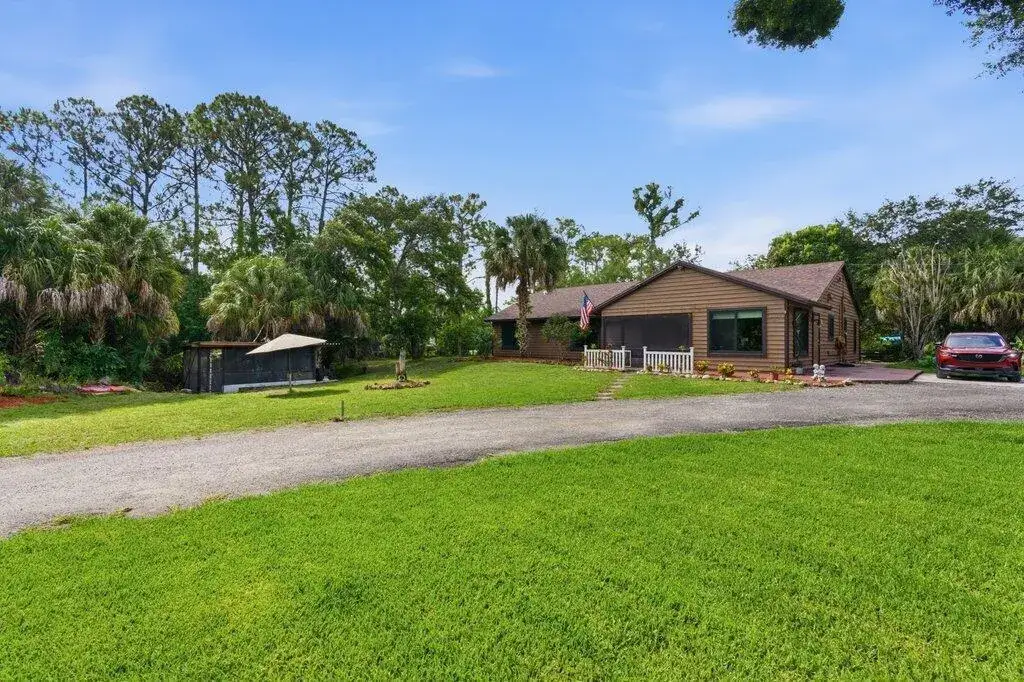 4 bedroom 2 bath Residential for sale at 16888 Hialeah Drive W, FL 33470