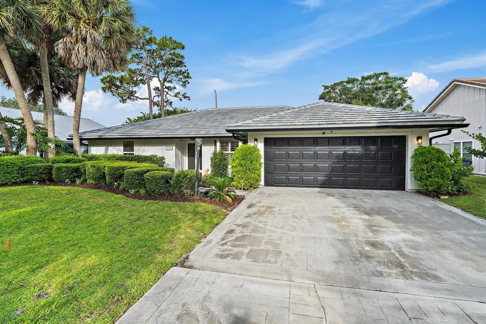 4 bedroom 2 bath Residential for sale at 18169 Lake Bend Drive, Jupiter FL 33458