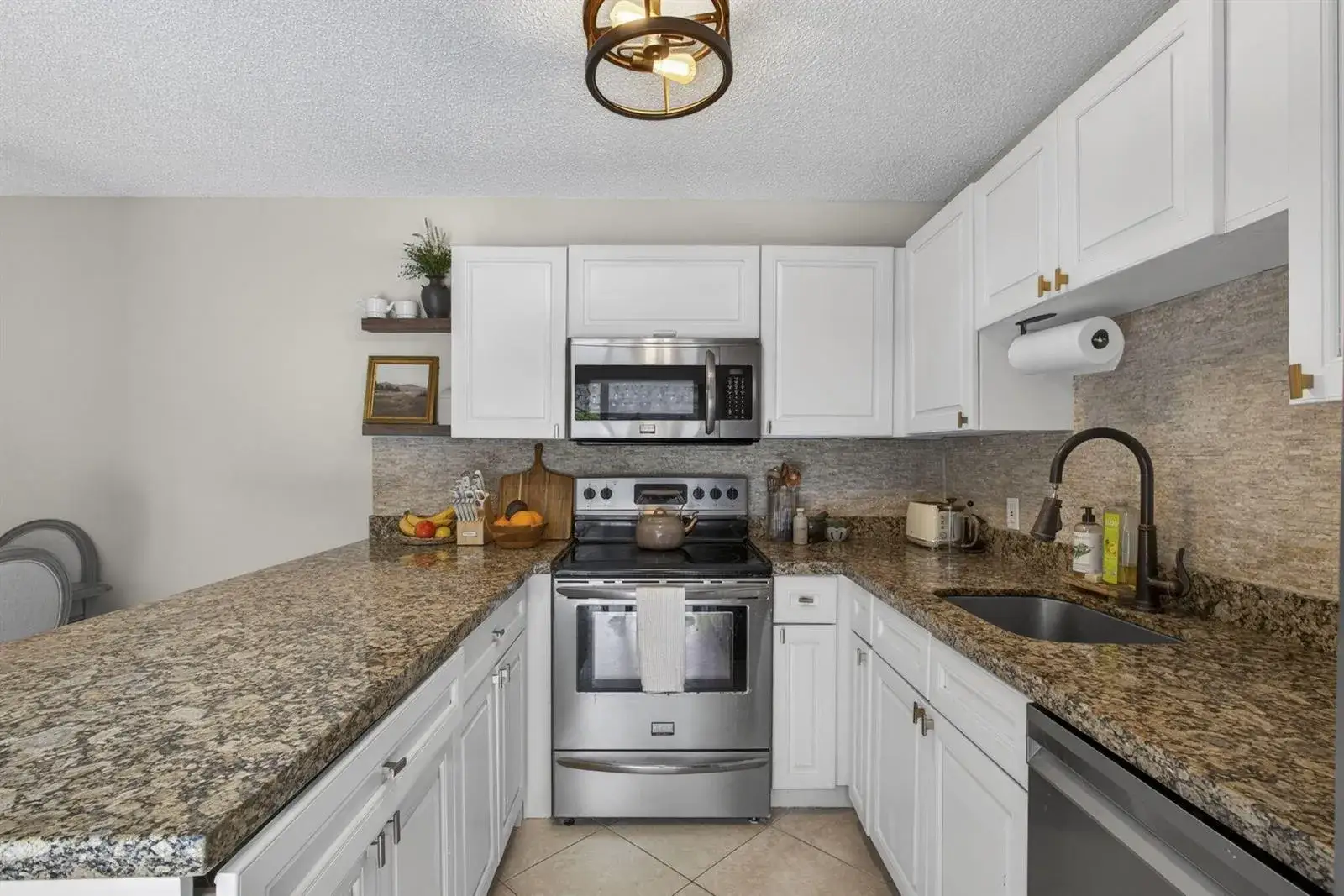 3 bedroom 2 bath Residential for sale at 121 1st Terrace, Palm Beach Gardens FL 33418