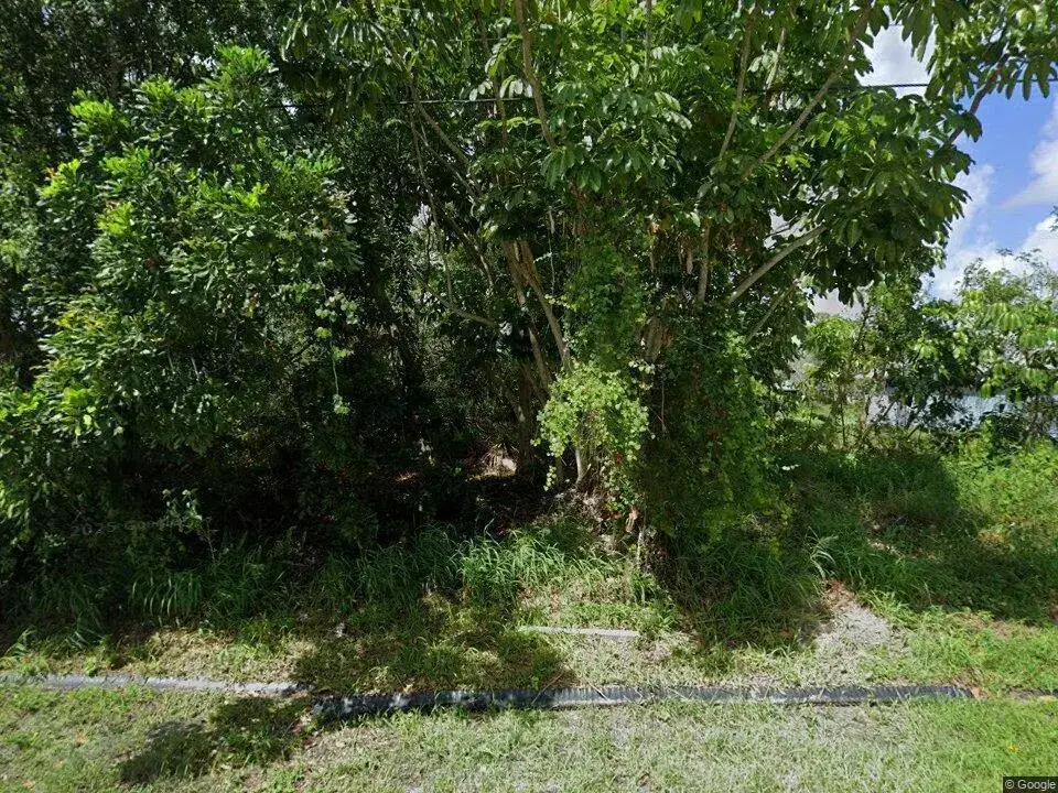 Commercial Land for sale at 512 SW Sansom Lane, FL 34953