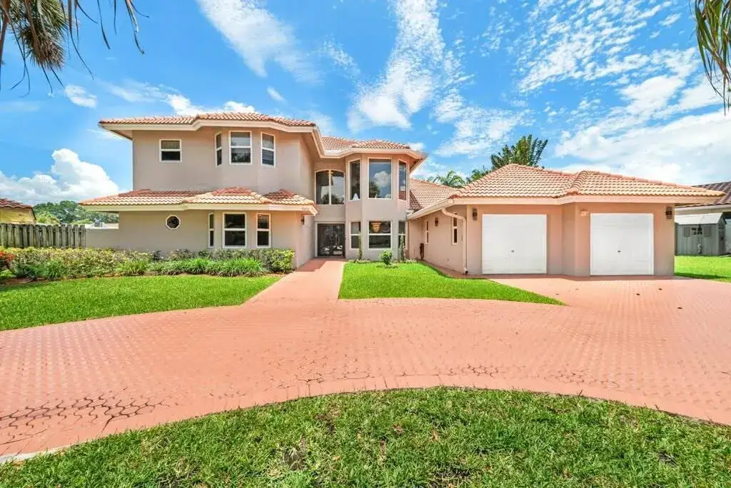 5 bedroom 4 bath Residential for sale at 9410 Sea Turtle Manor, Plantation FL 33324