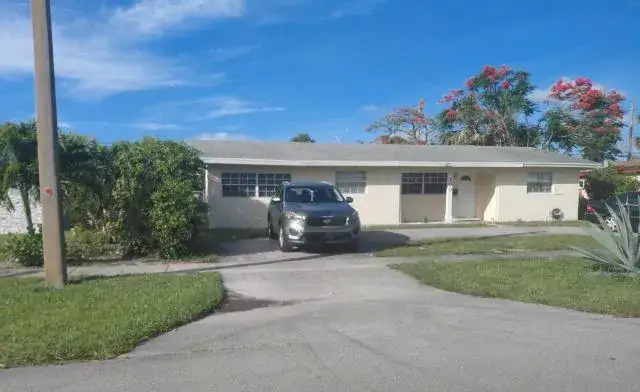 4 bedroom 2 bath Residential for sale at 200 N Ware Drive, West Palm Beach FL 33409