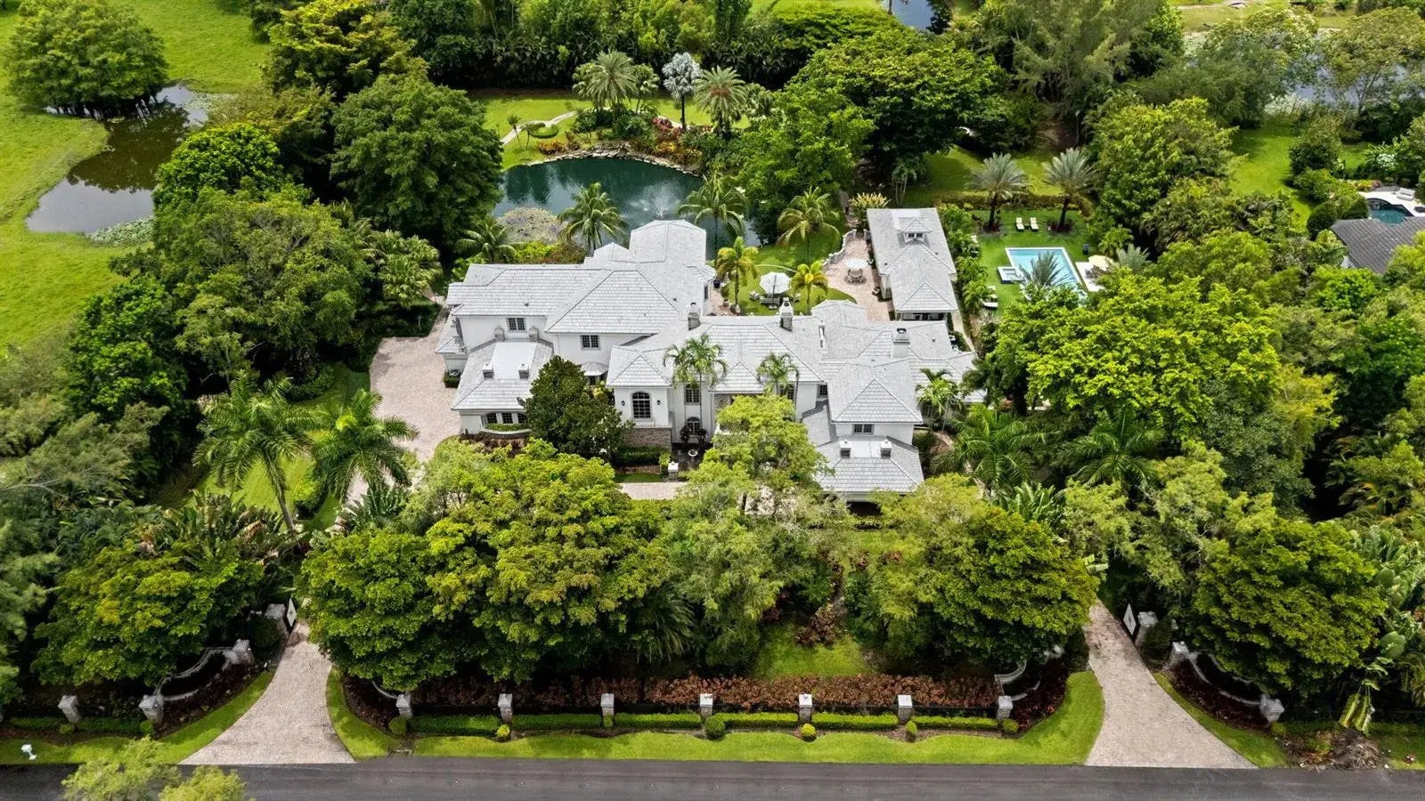 6 bedroom 6 bath Residential for sale at 8950 NW 70th Court, Parkland FL 33067