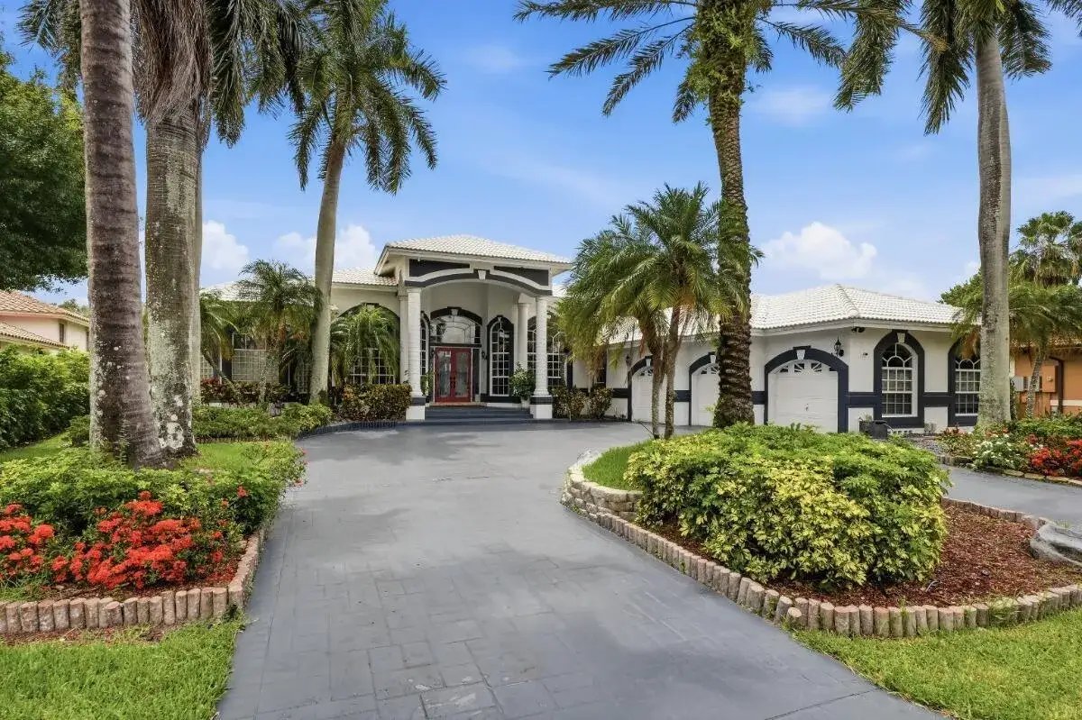 5 bedroom 4 bath Residential for sale at 1716 NW 124th Way, Coral Springs FL 33071