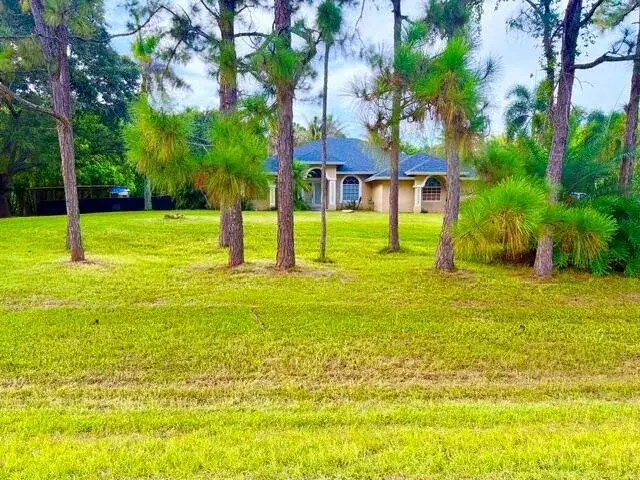 4 bedroom 2 bath Residential for sale at 12377 77TH Place N, FL 33412