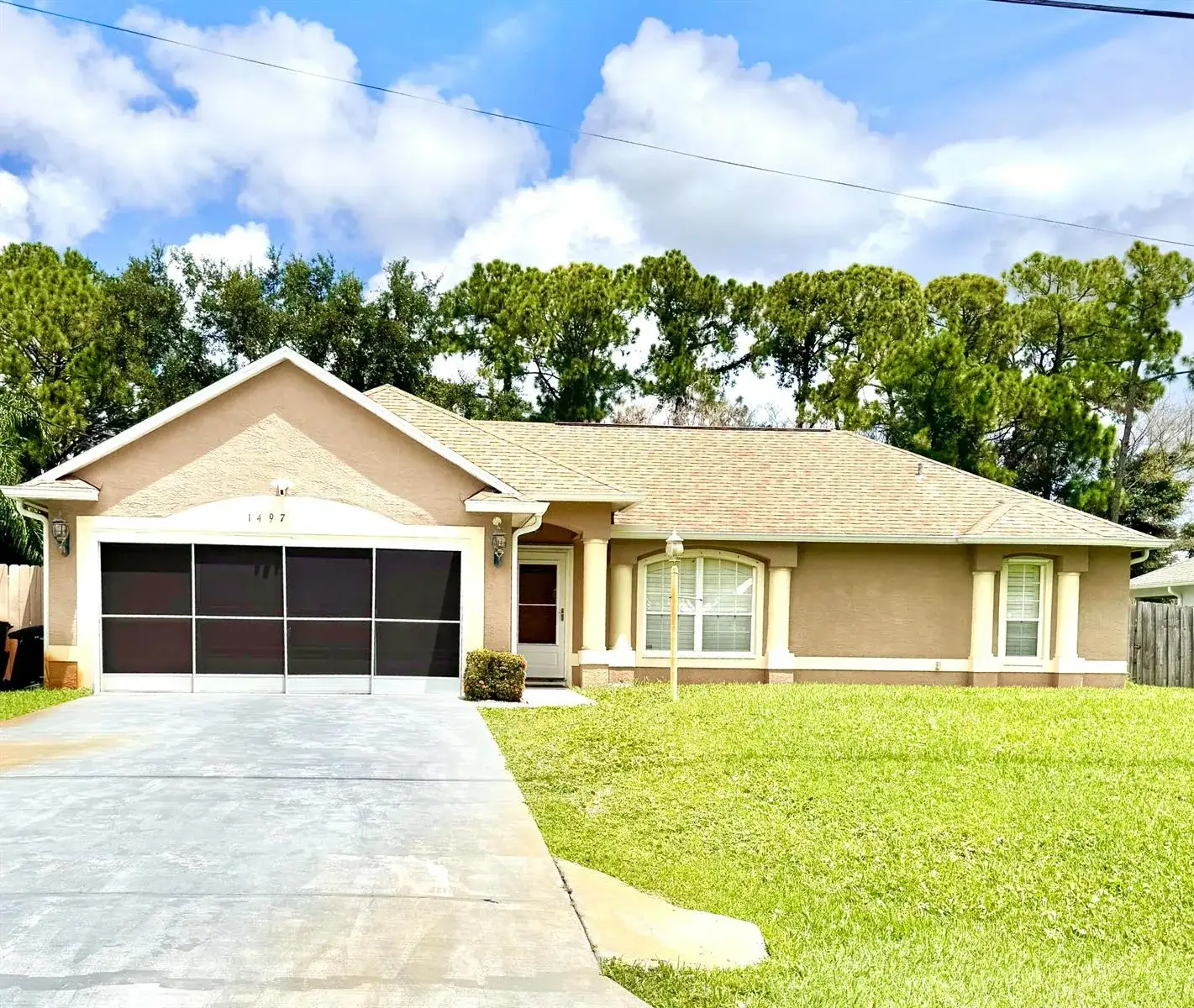 3 bedroom 2 bath Residential for sale at 1497 SW Wepaco Avenue, Port St. Lucie FL 34953