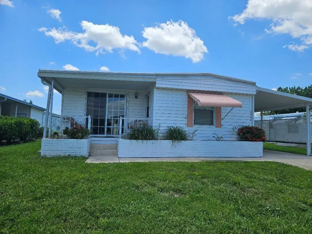 2 bedroom 2 bath Residential for sale at 6948 SE DELEGATE Street, Hobe Sound FL 33455