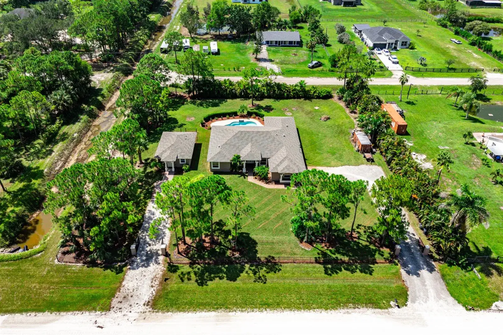 5 bedroom 4 bath Residential for sale at 18266 Murcott Boulevard, FL 33470