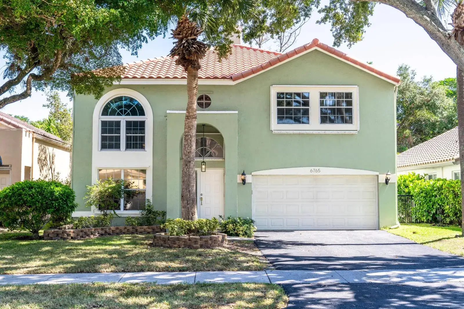 5 bedroom 3 bath Residential for sale at 6765 NW 75th Place, Parkland FL 33067