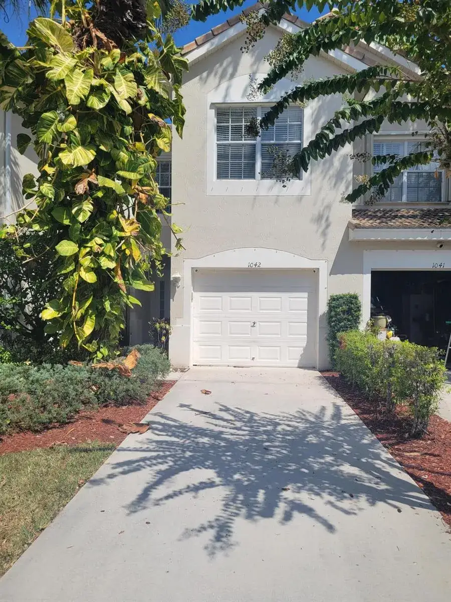 3 bedroom 2 bath Residential for sale at 1042 Woodfield Road, FL 33415