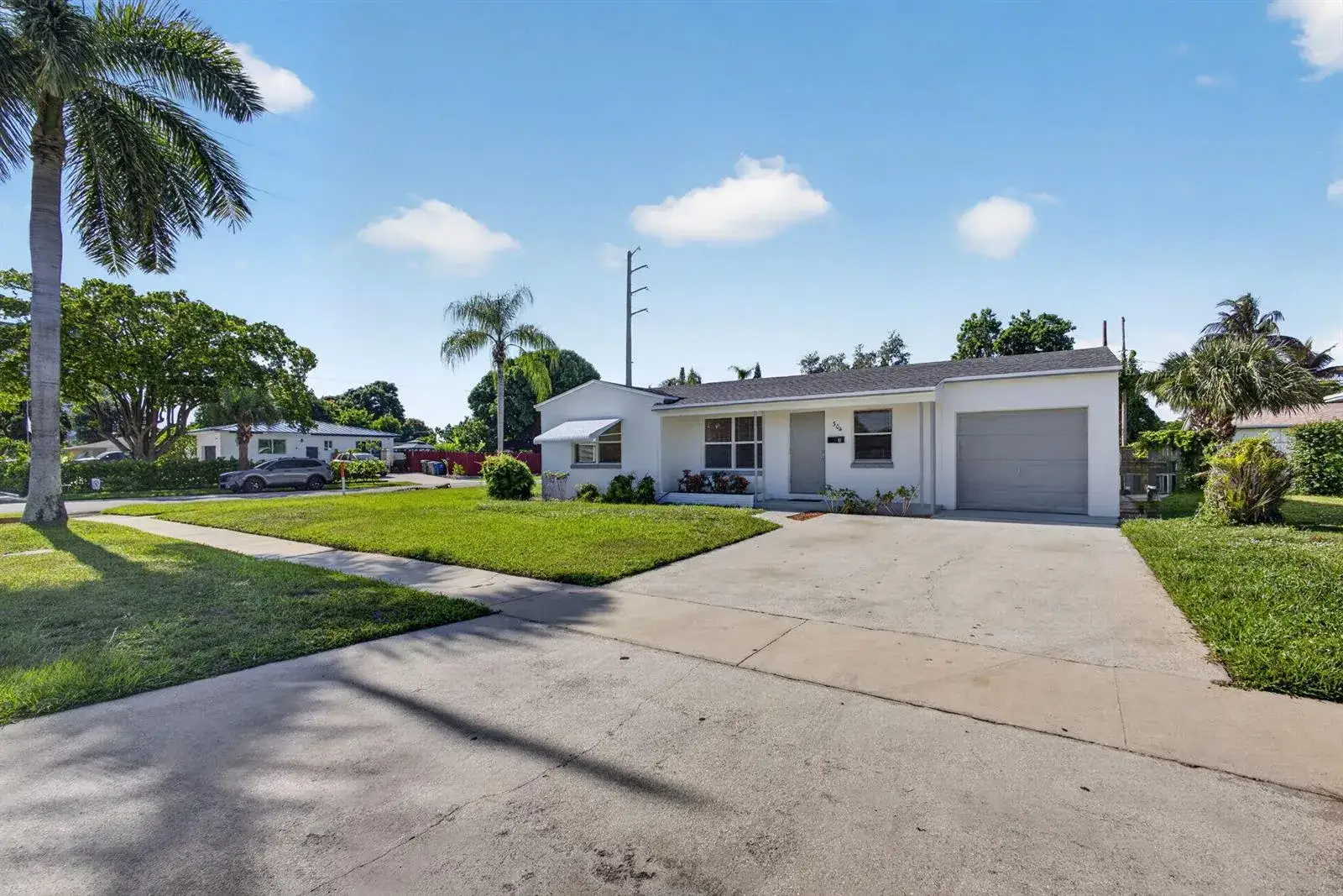 4 bedroom 3 bath Residential for sale at 304 Cypress Drive, Lake Park FL 33403