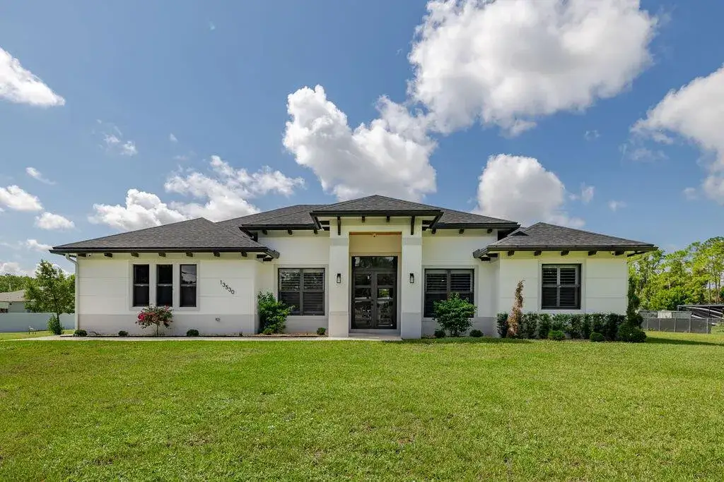 4 bedroom 3 bath Residential for sale at 13530 55TH Road N, FL 33411