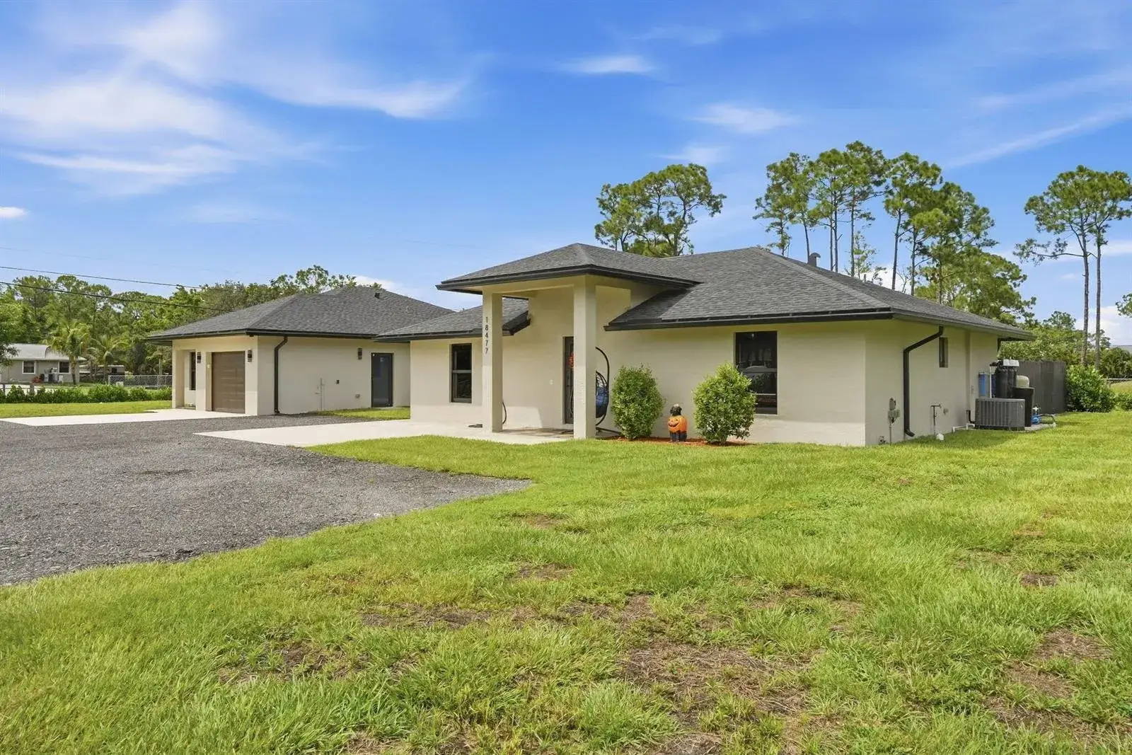 5 bedroom 4 bath Residential for sale at 18477 Sycamore Drive W, FL 33470