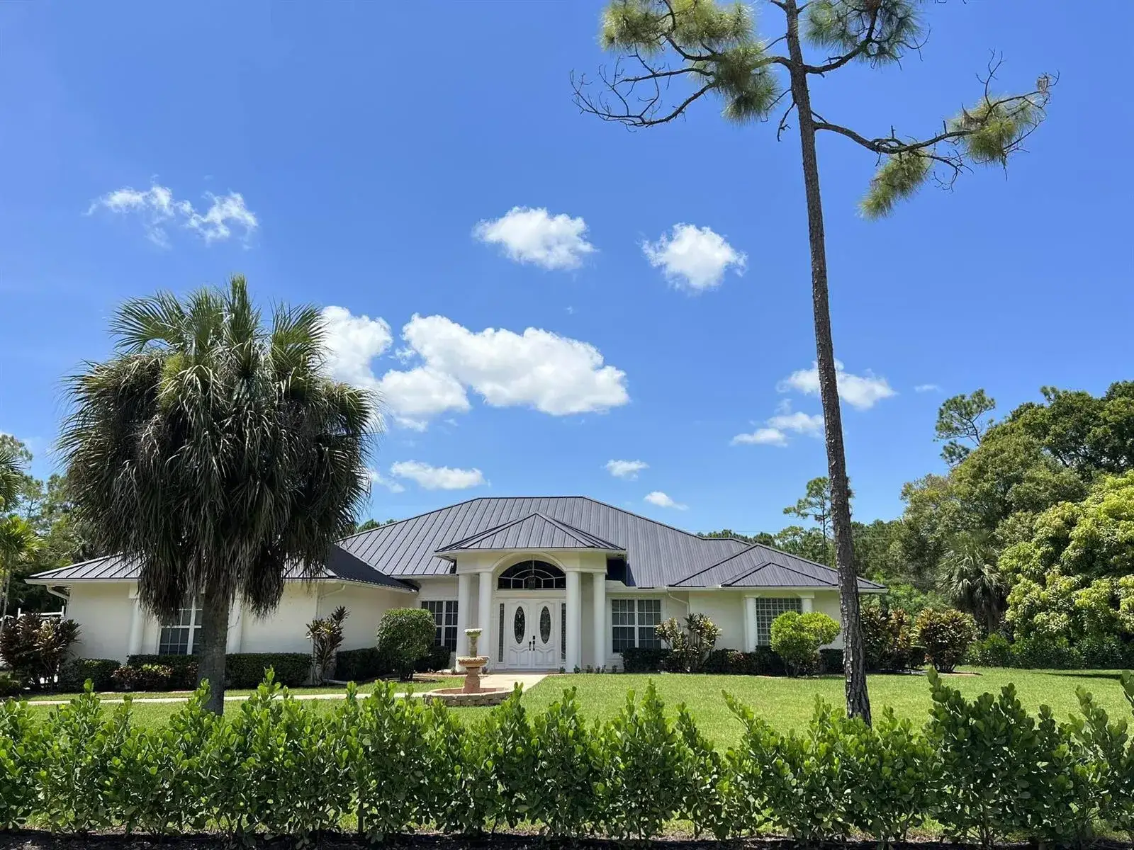 5 bedroom 4 bath Residential for sale at 103 Squire Drive, Wellington FL 33414