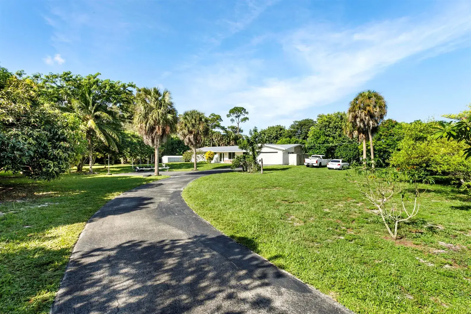 4 bedroom 3 bath Residential for sale at 5200 Club Road, Haverhill FL 33415