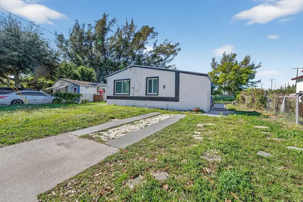 4 bedroom 2 bath Residential for sale at 5909 Pinewood Avenue, West Palm Beach FL 33407