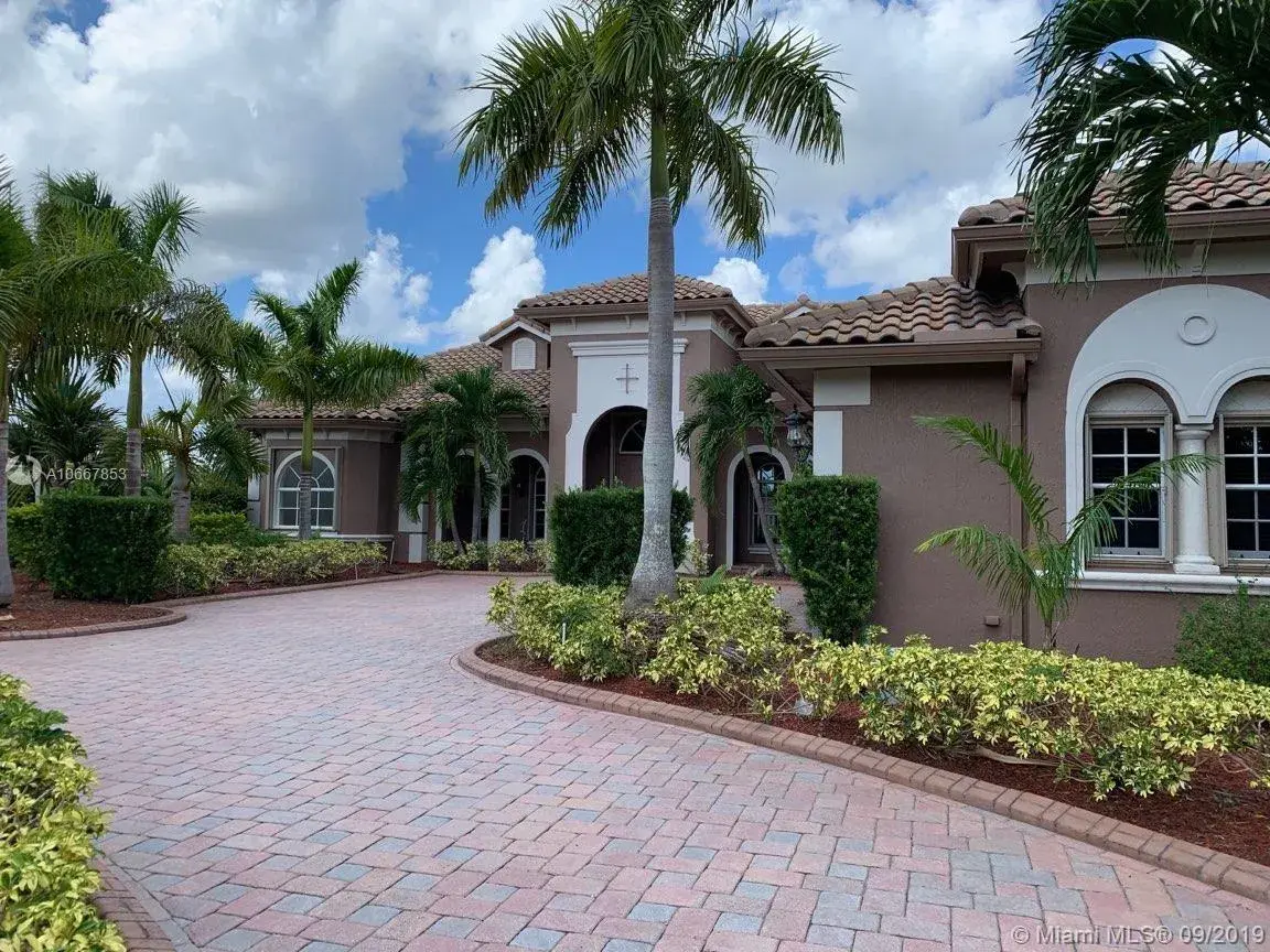 5 bedroom 5 bath Residential for sale at 14443 S Jockey Cir S, Davie FL 33330