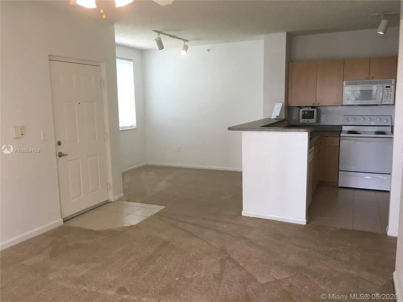 7910 N Nob Hill Rd # 101, Tamarac FL 33321