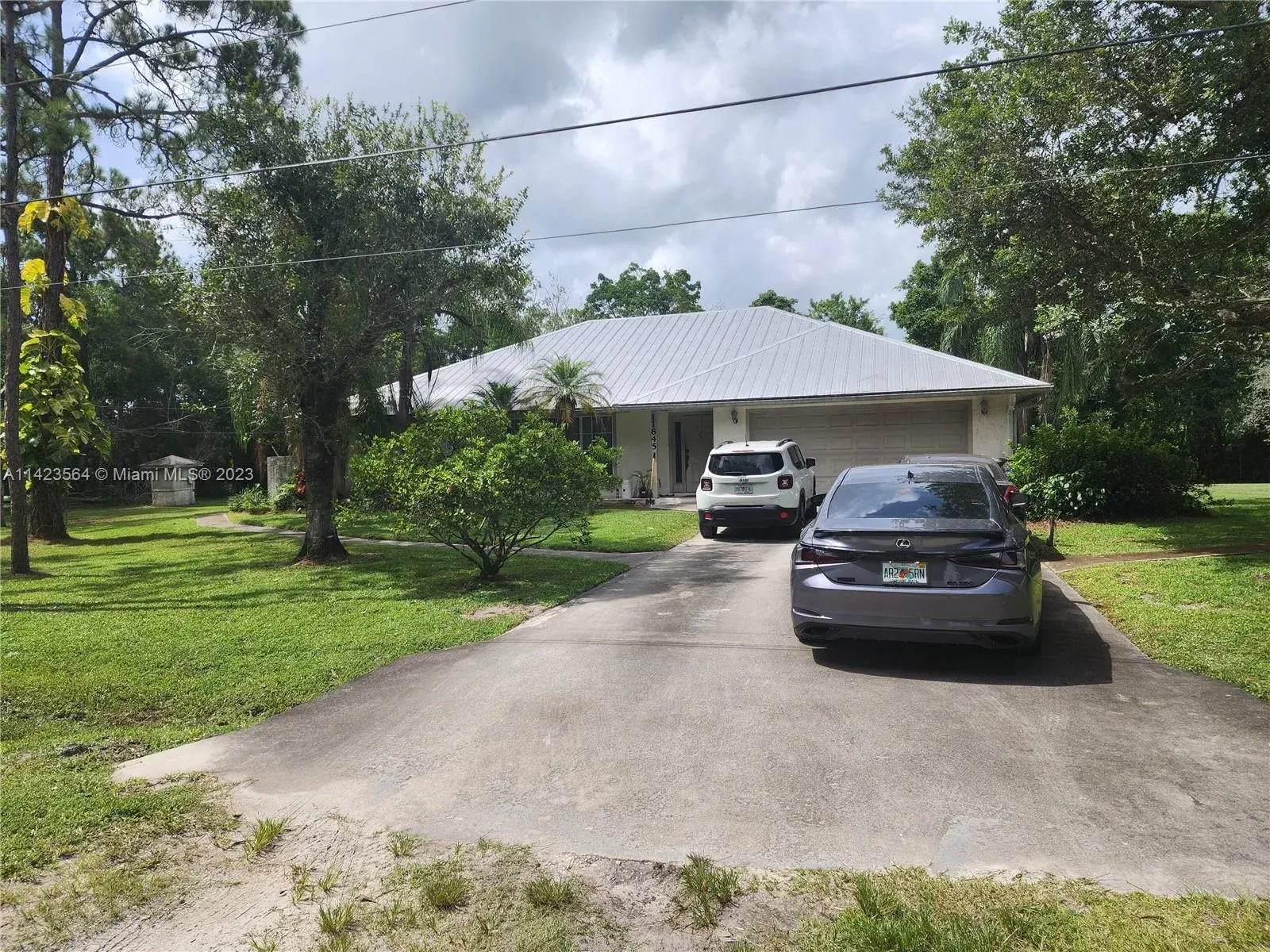 4 bedroom 2 bath for sale at 11845 N 171st Ln N, Jupiter FL 33478