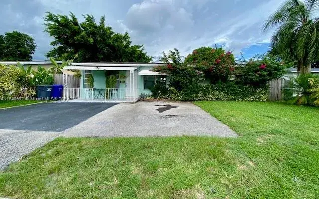4 bedroom 2 bath Residential for sale at 6761 Sheridan St, Hollywood FL 33024