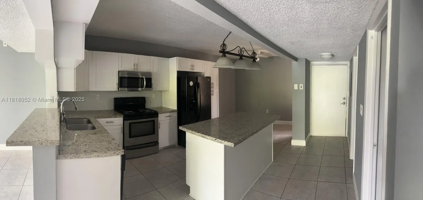 8401 W Sample Rd # 18, Coral Springs FL 33065