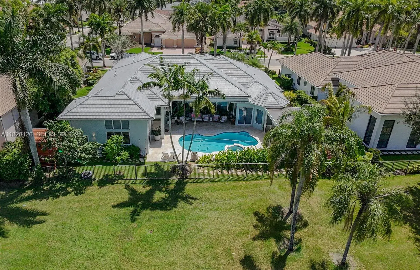 5 bedroom 4 bath Residential for sale at 2493 Poinciana Dr, Weston FL 33327