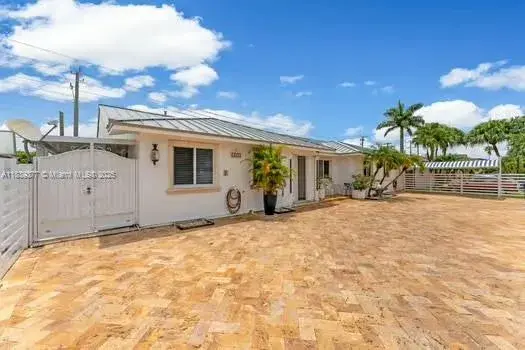 323 NW 136th Pl, Miami FL 33182